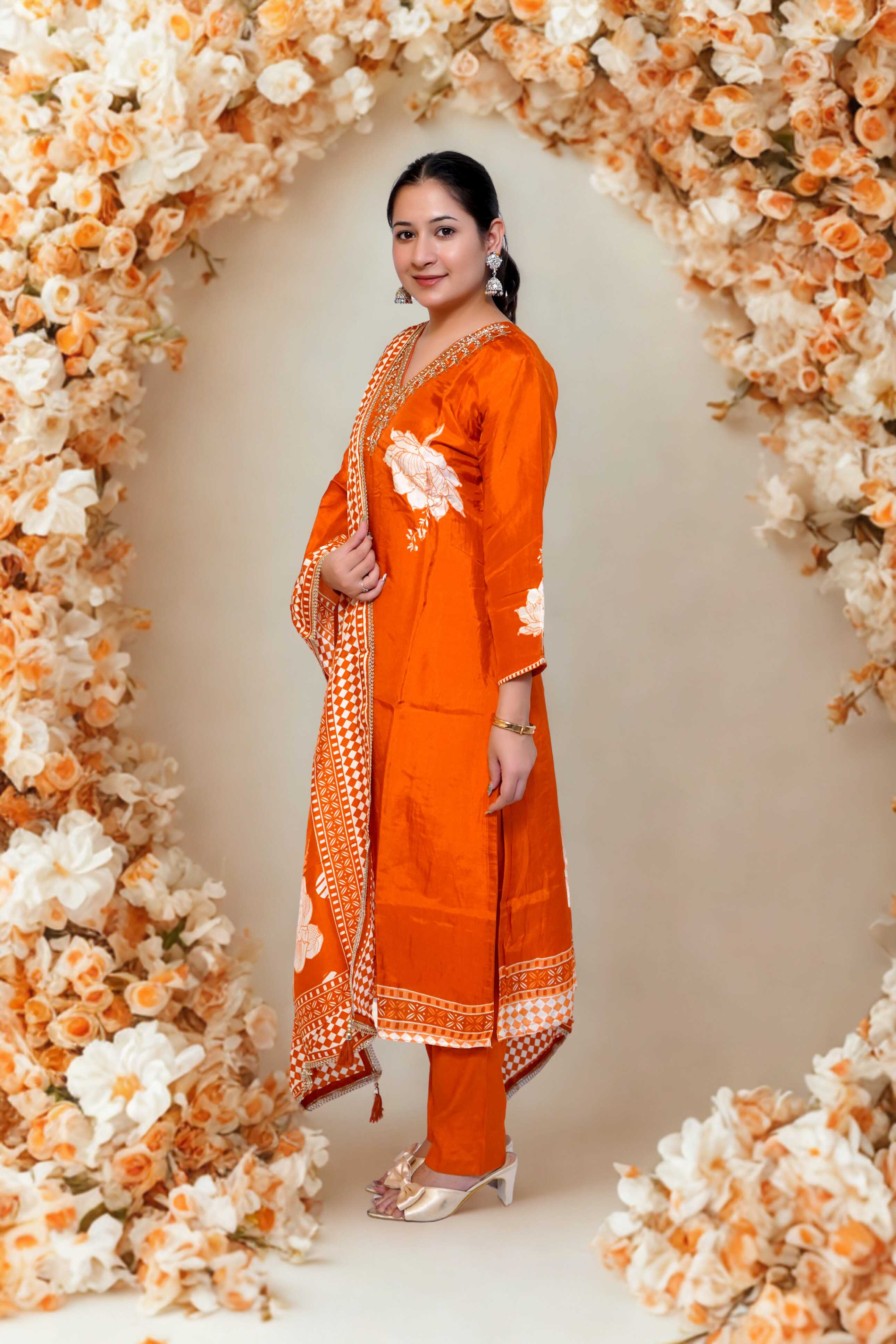 Orange stitched suit with neck embroidery