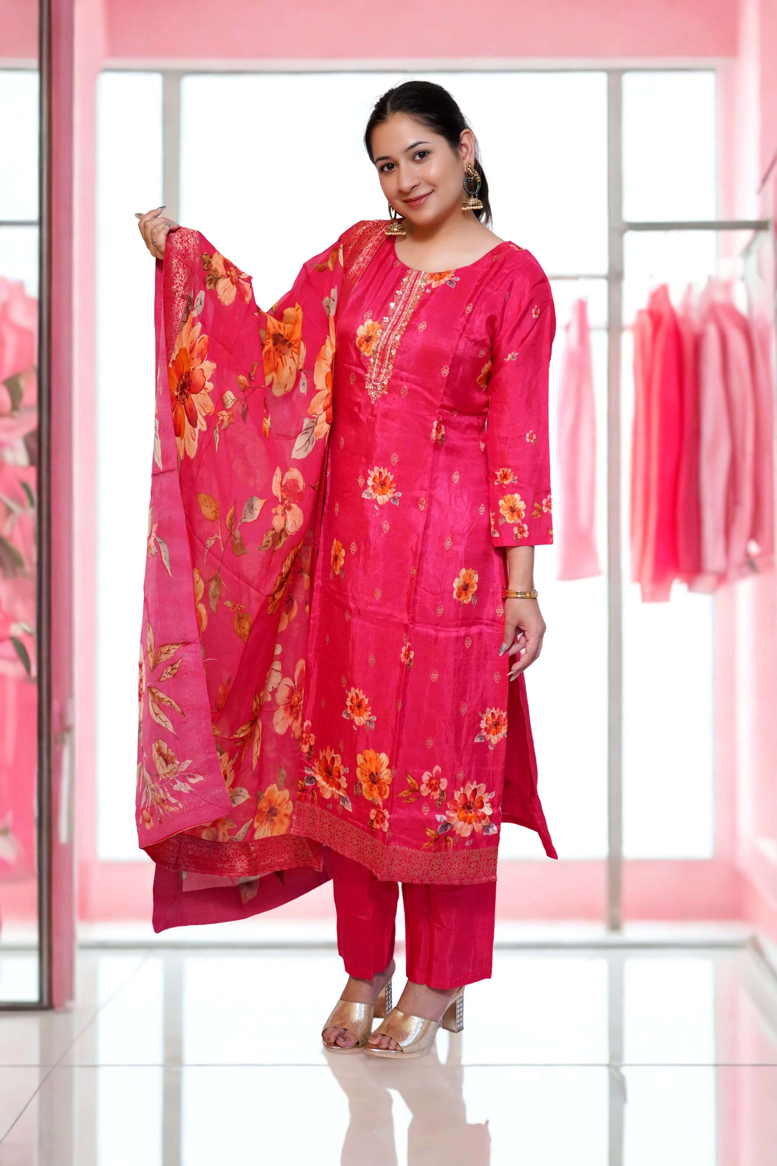 Rani embroidered suit with floral dupatta